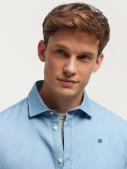 POLERA DENIM CELESTE